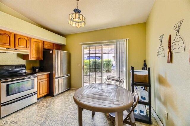 kitchen featuring pendant lighting and appliances with stainless steel finishes