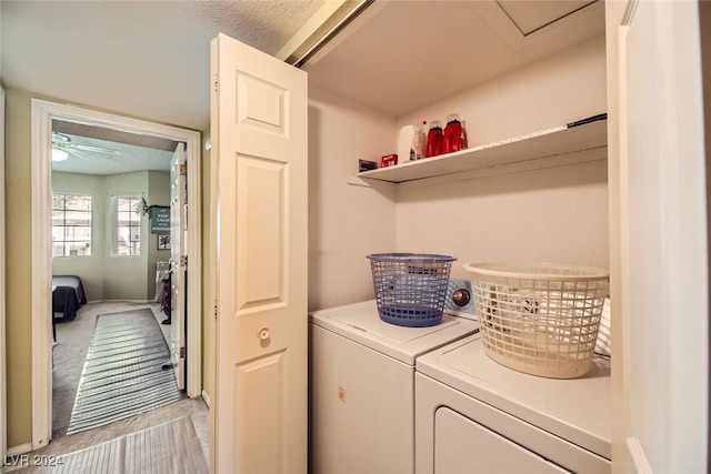 laundry area featuring ceiling fan and washing machine and dryer