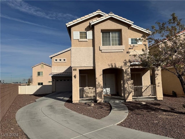 view of front of home with a garage