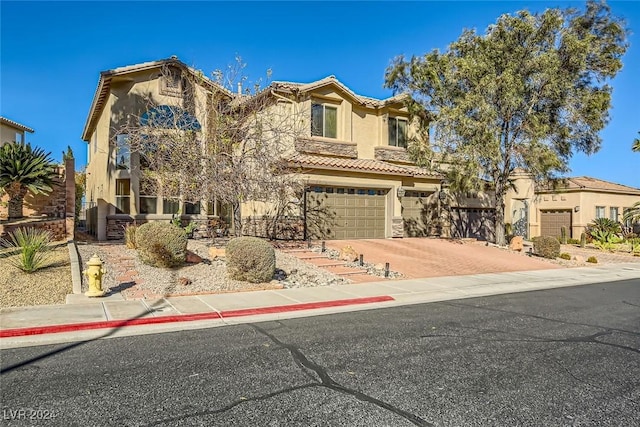 view of front of property with a garage