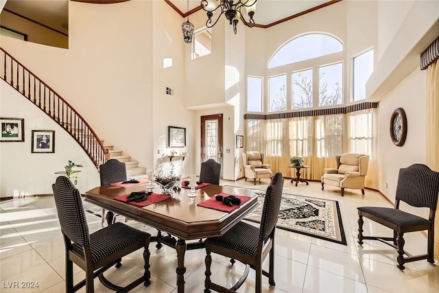 373 Via Sonador, Henderson, NV 89012 - tiled dining area featuring a high ceiling and an inviting chandelier