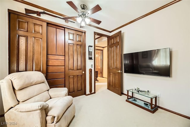 373 Via Sonador, Henderson, NV 89012 - living area featuring light colored carpet, ceiling fan, and ornamental molding