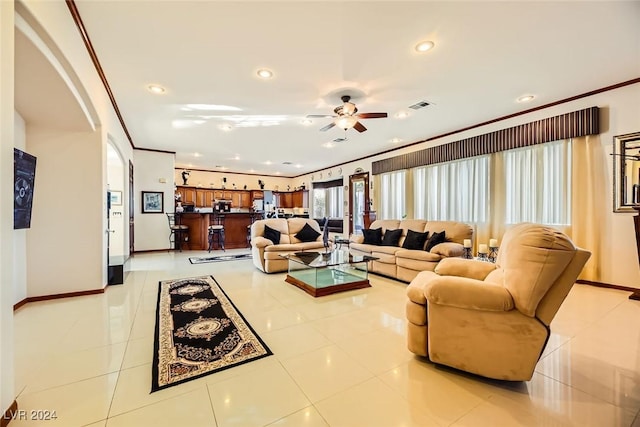 373 Via Sonador, Henderson, NV 89012 - living room featuring ceiling fan, light tile patterned floors, and ornamental molding