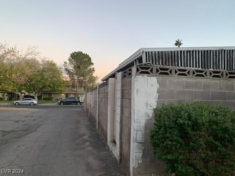 view of property exterior at dusk