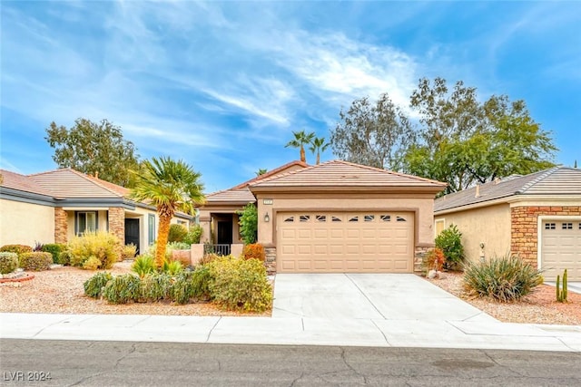 ranch-style house featuring a garage