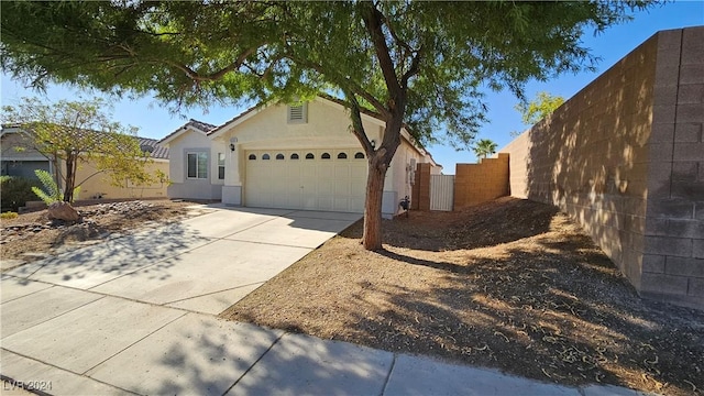 view of property exterior featuring a garage