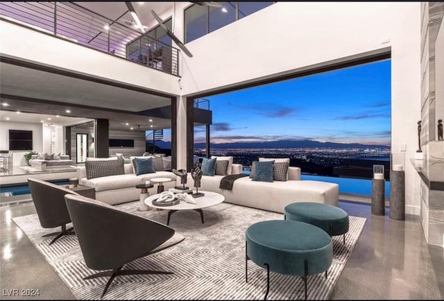 living room with a high ceiling