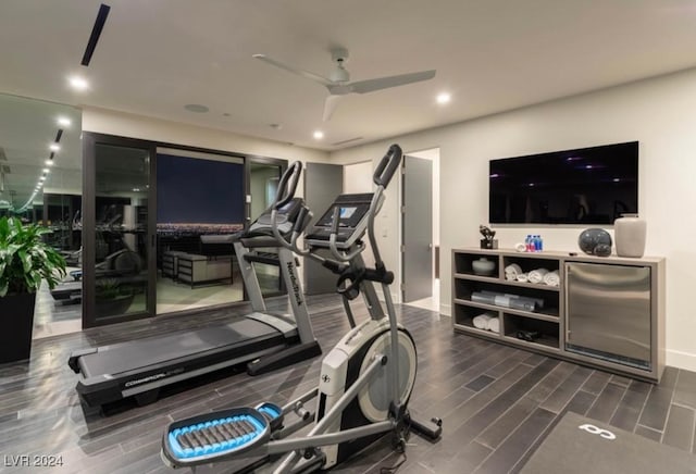 workout area with hardwood / wood-style flooring and ceiling fan