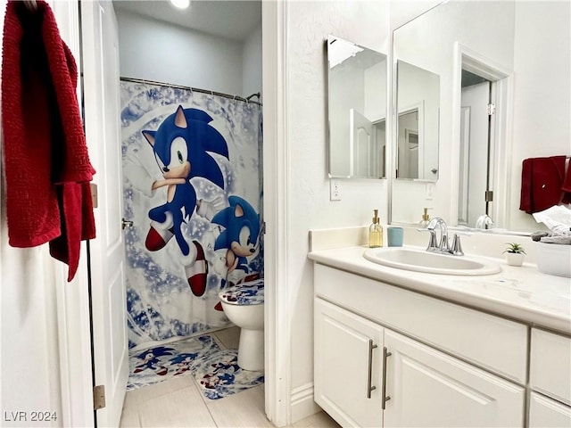 bathroom with tile patterned flooring, a shower with curtain, vanity, and toilet