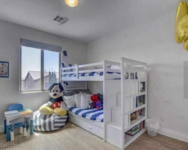 bedroom featuring hardwood / wood-style flooring