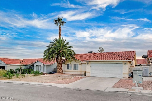 view of front of property with a garage