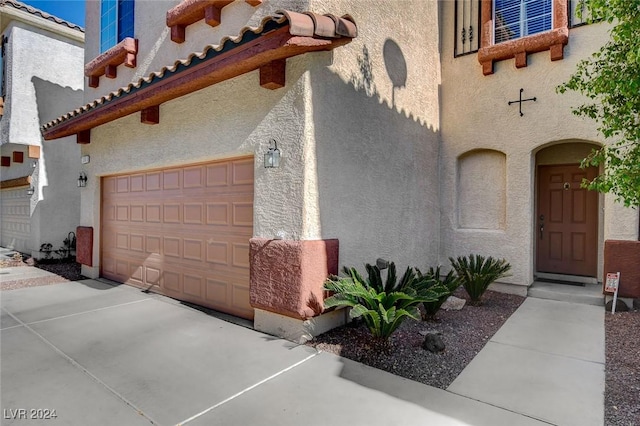 view of home's exterior with a garage