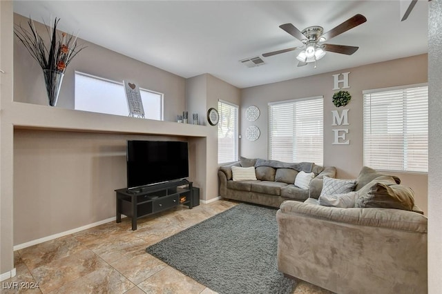 living room featuring ceiling fan