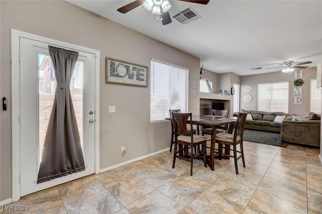 dining room with ceiling fan