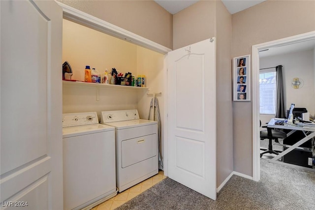 washroom featuring light carpet and separate washer and dryer