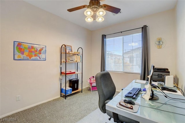 home office with ceiling fan and carpet floors