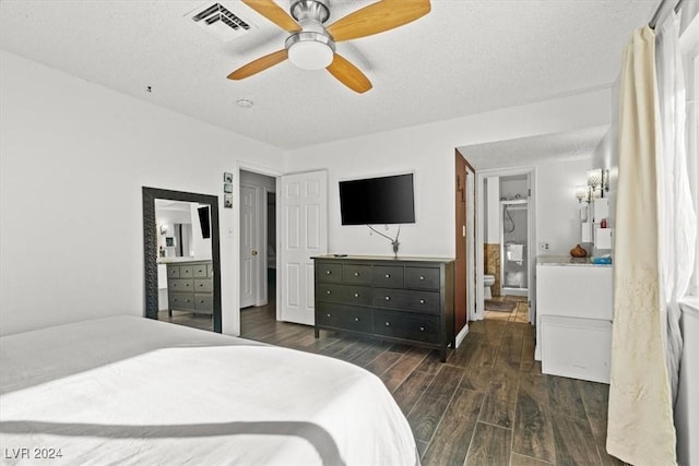 bedroom featuring ceiling fan, dark hardwood / wood-style flooring, and a textured ceiling