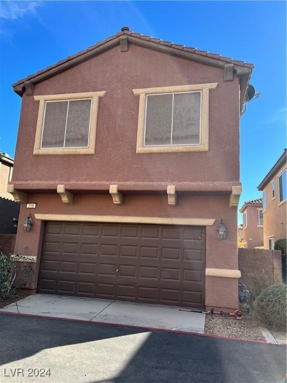 exterior space featuring a garage