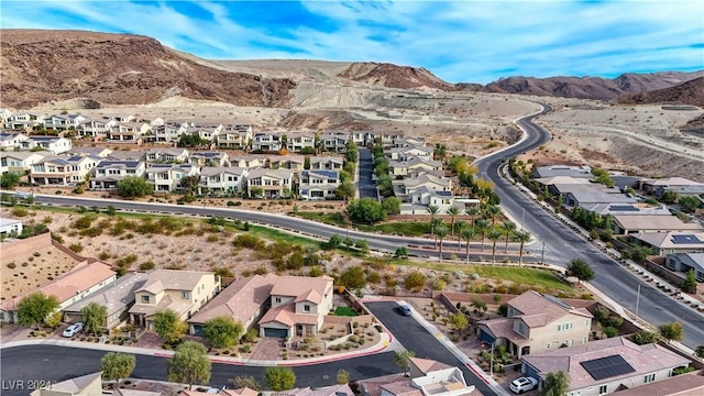 drone / aerial view featuring a mountain view