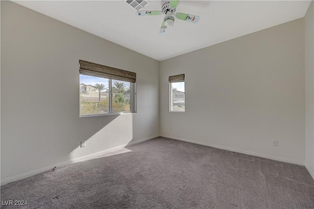 carpeted empty room with ceiling fan