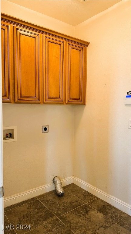 laundry room with cabinets, hookup for a washing machine, and electric dryer hookup