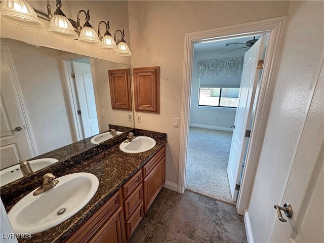 bathroom featuring vanity and ceiling fan