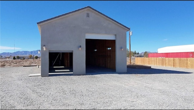 garage featuring a mountain view