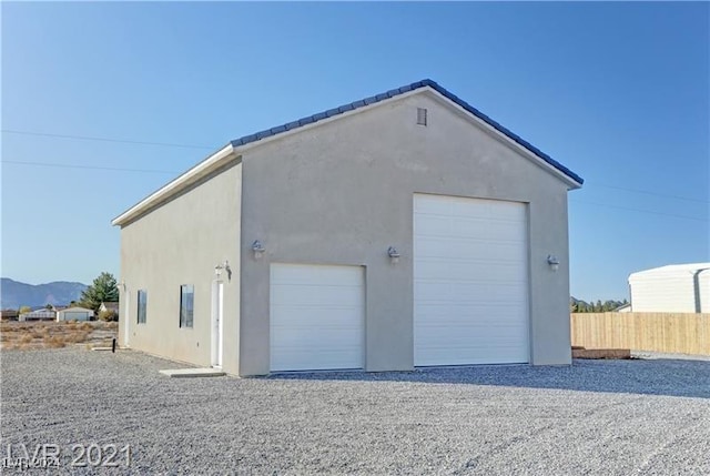 garage featuring a mountain view