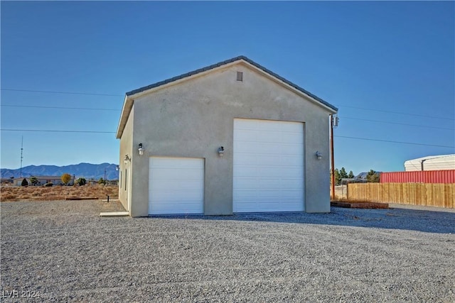 garage featuring a mountain view