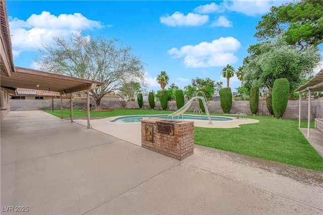 exterior space with a fenced backyard and a fenced in pool