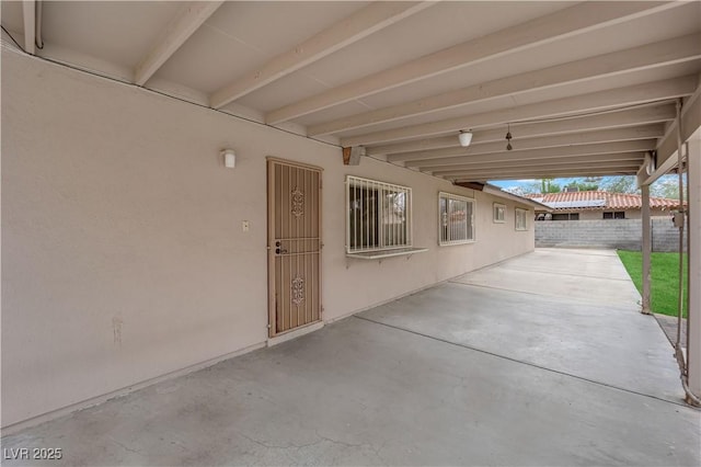 view of patio featuring fence