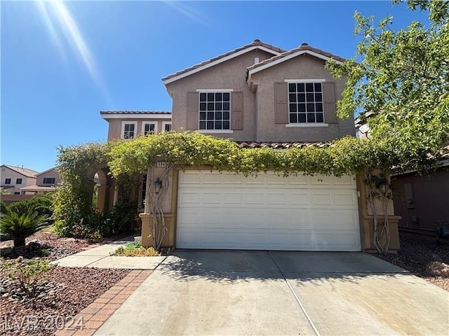 view of front of house with a garage