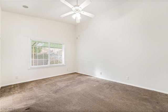 empty room with carpet flooring and ceiling fan