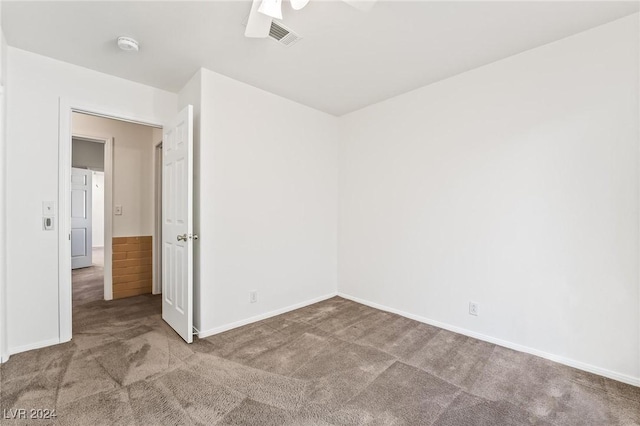 unfurnished room with carpet