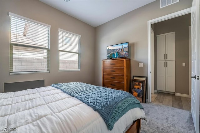 bedroom featuring hardwood / wood-style flooring