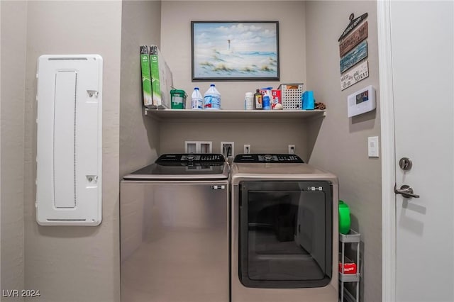 washroom with washer and clothes dryer