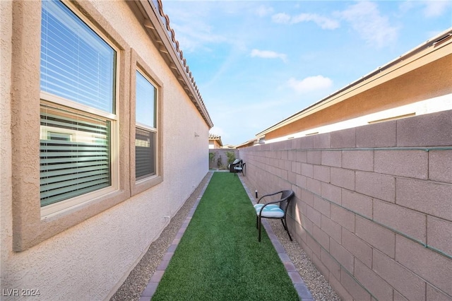 view of property exterior featuring a yard