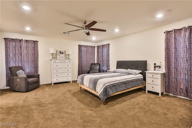 bedroom with ceiling fan and carpet floors