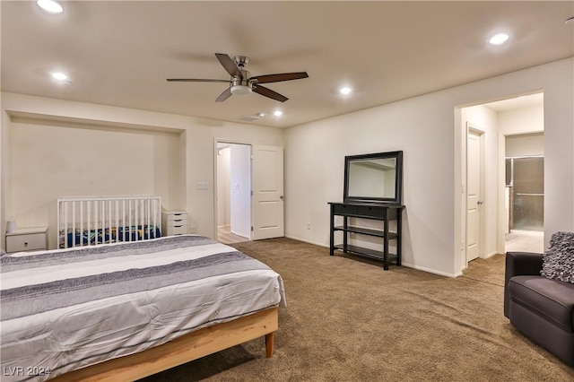 bedroom featuring ceiling fan, carpet floors, and stainless steel refrigerator