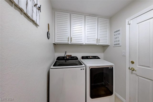5035 Shoal Creek Cir, Las Vegas, NV 89113 - washroom featuring cabinet space and separate washer and dryer