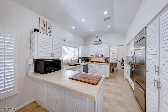 5035 Shoal Creek Cir, Las Vegas, NV 89113 - kitchen featuring a sink, stainless steel appliances, a peninsula, light countertops, and white cabinetry