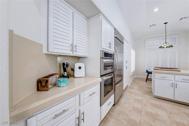 5035 Shoal Creek Cir, Las Vegas, NV 89113 - kitchen featuring white cabinets, light tile patterned floors, light countertops, and recessed lighting
