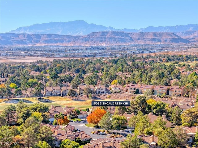 bird's eye view with a mountain view