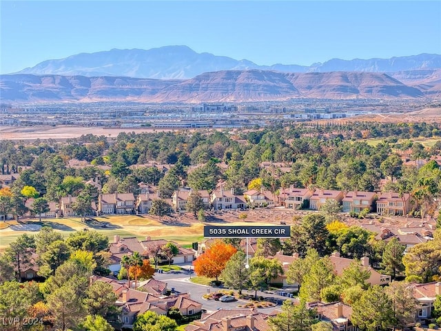 5035 Shoal Creek Cir, Las Vegas, NV 89113 - aerial perspective of suburban area with a mountain backdrop