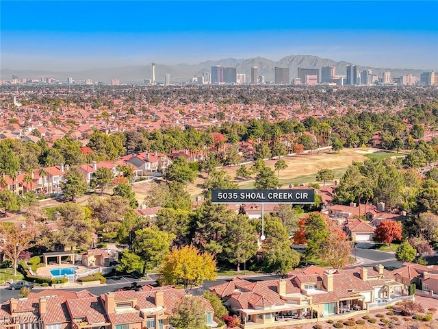 drone / aerial view featuring a mountain view