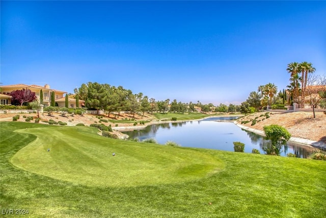 5035 Shoal Creek Cir, Las Vegas, NV 89113 - view of property's community featuring a water view, view of golf course, and a lawn
