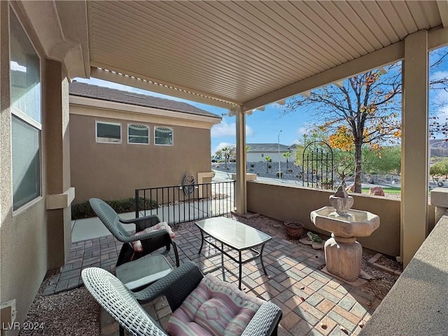 view of patio / terrace featuring a water view