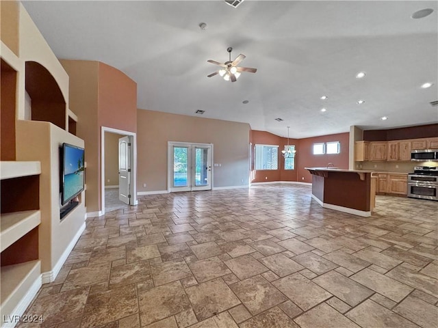 kitchen with a center island with sink, plenty of natural light, ceiling fan, and appliances with stainless steel finishes