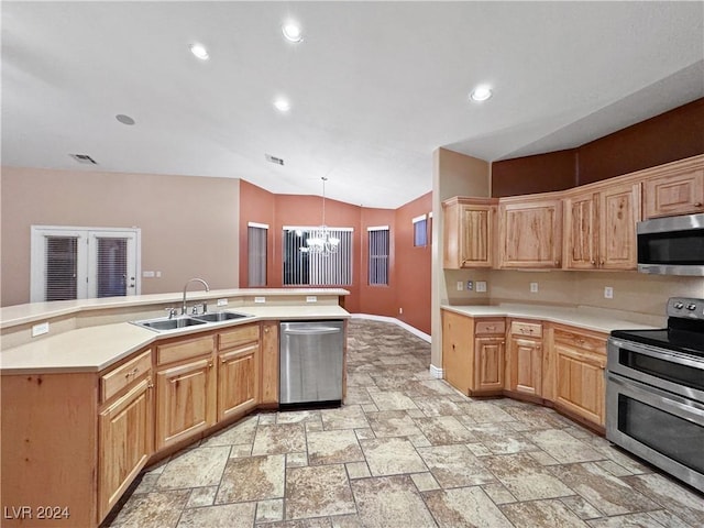 kitchen with stainless steel appliances, vaulted ceiling, sink, decorative light fixtures, and a notable chandelier