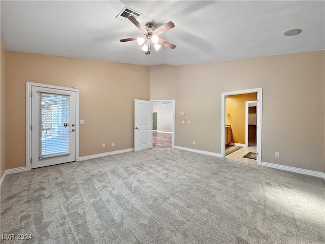 interior space with ceiling fan